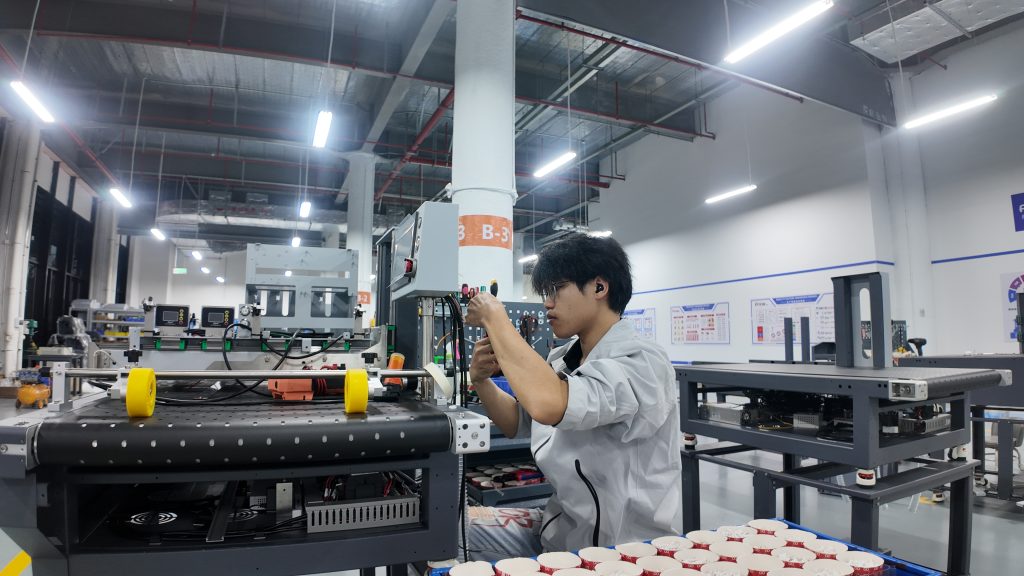 FocusInc Technician Testing COBRA-1209S Corrugated Printer in Factory